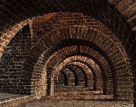 Trompe l'oeil wallpaper Bricks Passage