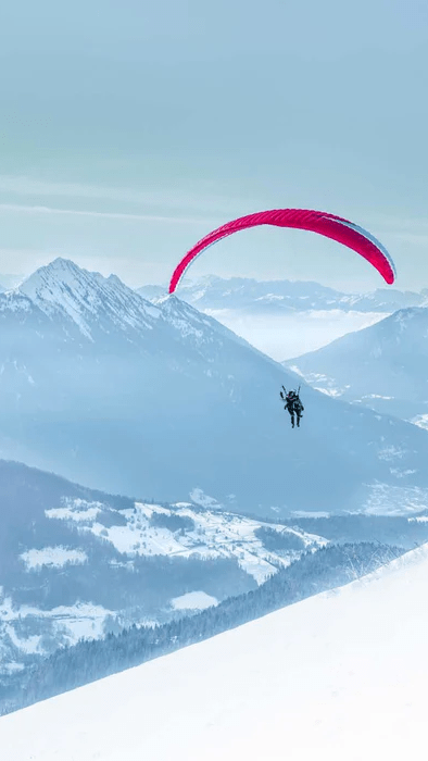 Papier peint photo montagne fly in the Alps bleu - Muralconcept